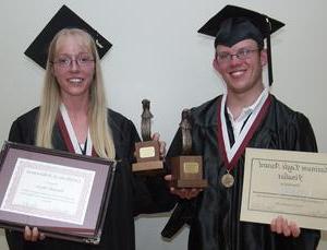 Kurt Elder and Danielle Meyer display their awards.